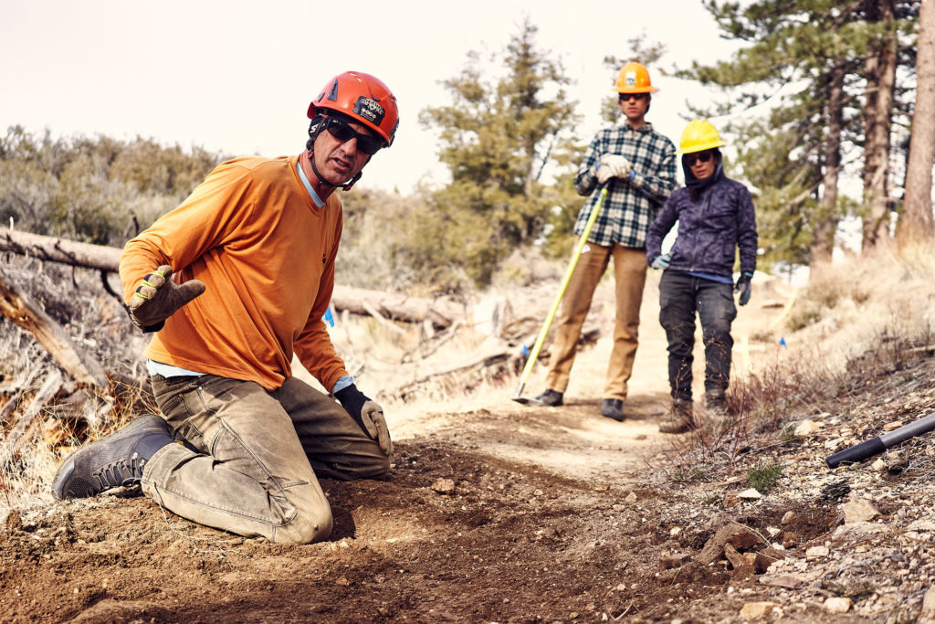 IMBA Trail Solutions' Joey Klein talking about drainage on site