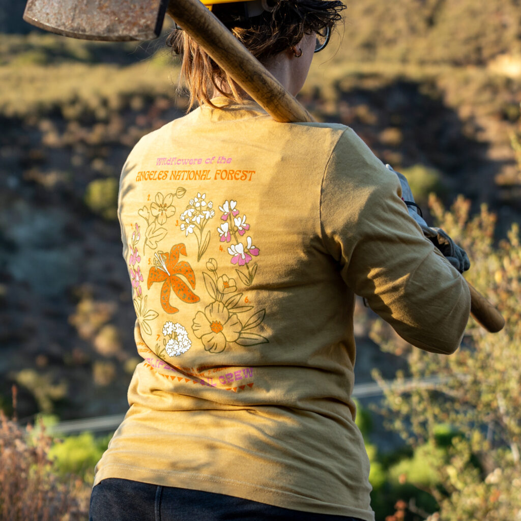 Yellow t-shirt on trail volunteer.